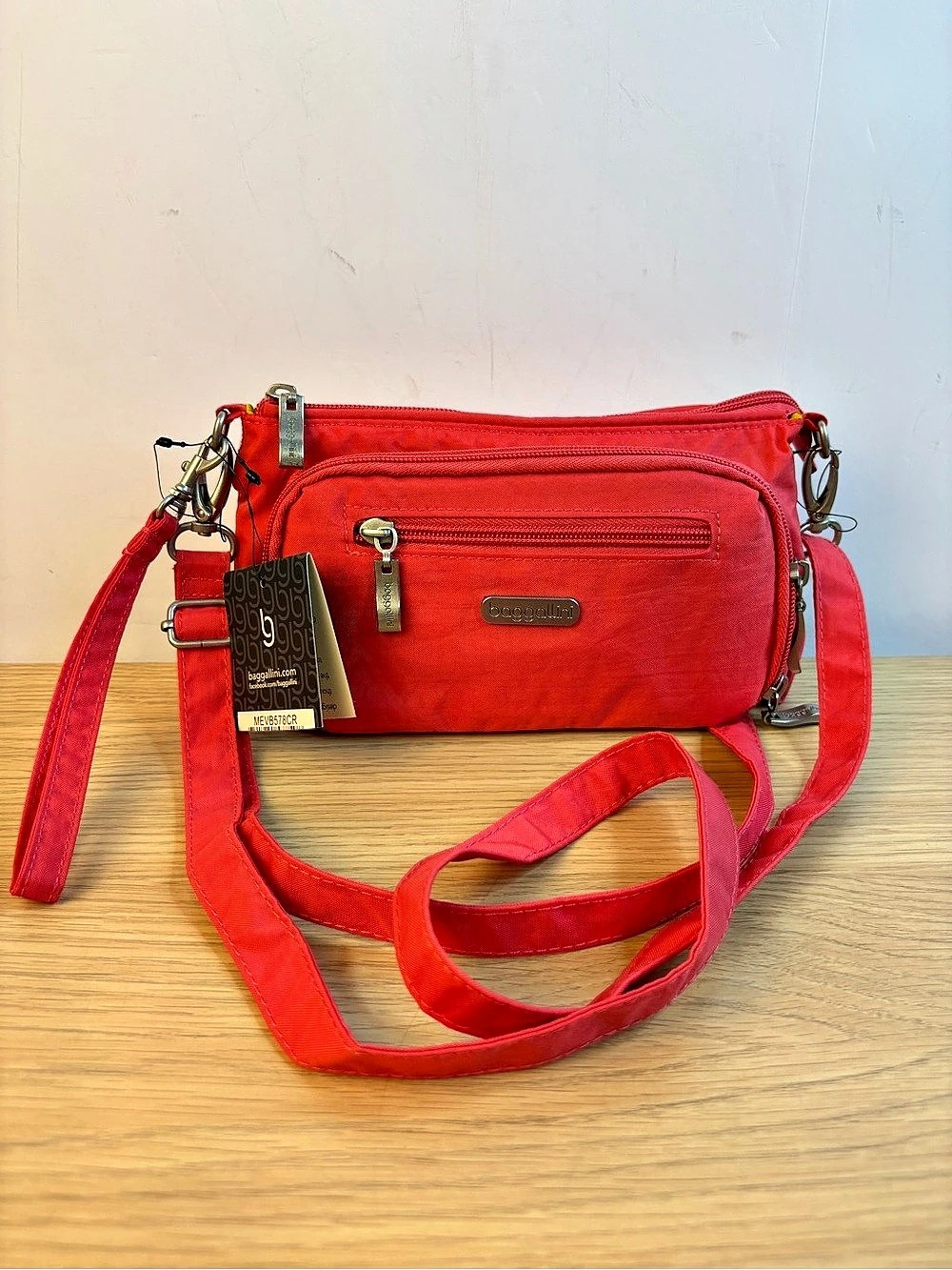 The Baggallini Legacy Triple Zip Pink Crossbody Bag NWT